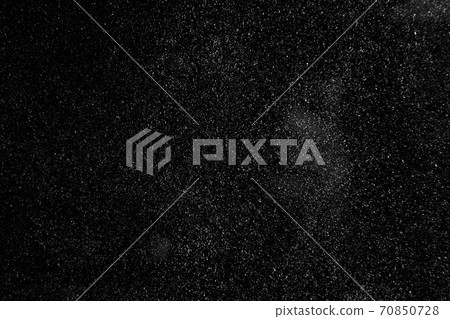 abstract real dust floating over black background for 70850728