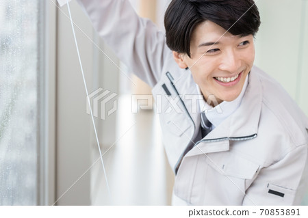 一個穿著工作服的男人的肖像 一個穿著工作服的男人的肖像 70853891