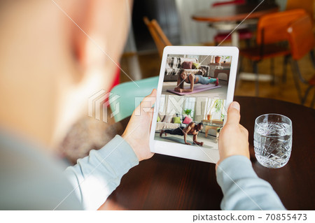 Remote working. Workplace in bar, restaurant office with PC, devices and gadgets. 70855473