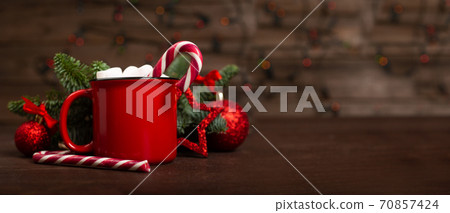 Cocoa red mug with marshmallows 70857424