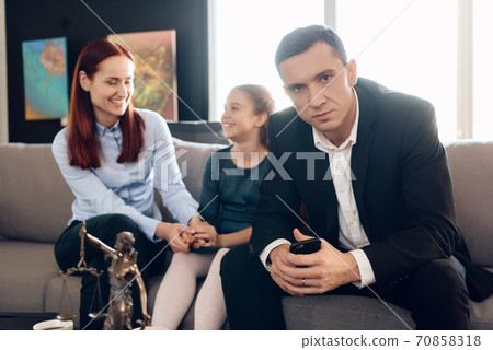 Frustrated father with phone in hands. Frustrated father with phone in hands. 70858318