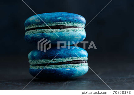 A couple of Ultra Violet macaroons and macarons with space pattern, macro. 70858378