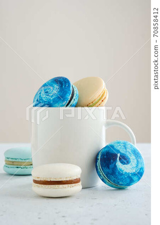 Homemade Colorful macaroons or macaron on White background. 70858412