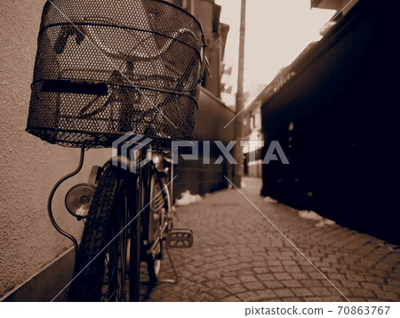 Kagurazaka Bicycle and Kakurenbo Yokocho with remaining snow 70863767