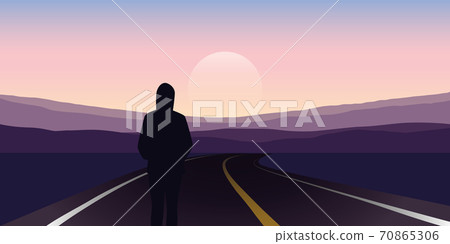 girl stand on the asphalt road and looks to the mountains 70865306