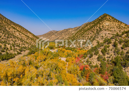 Aerial sunny view of beautiful fall color around Brian Head area 70866574