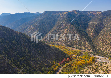 Aerial sunny view of beautiful fall color around Brian Head area 70866581