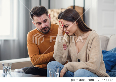 Upset couple is having quarrel at home. Family problems concept. 70867448