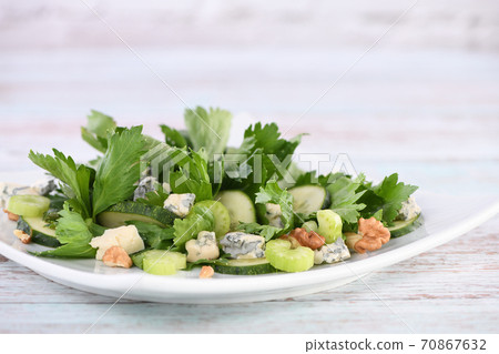 Celery with cucumber and cheese 70867632