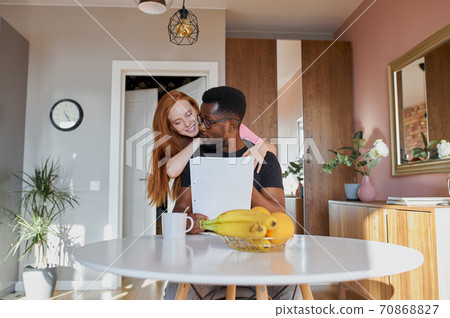 young supportive woman entertains, talk with working man 70868827
