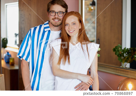 portrait of happy new home owners portrait of happy new home owners 70868897