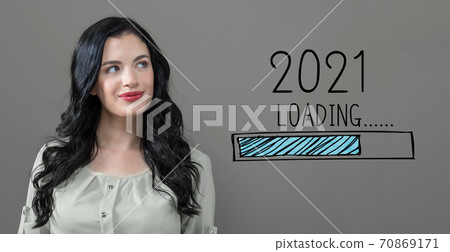 Loading new year 2021 with young woman 70869171