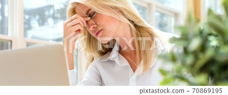 Young woman feeling stressed Young woman feeling stressed 70869195