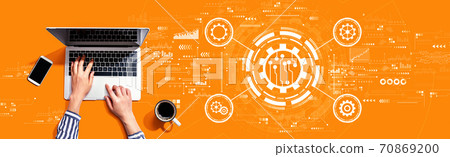 Automation concept with person using laptop Automation concept with person using laptop 70869200