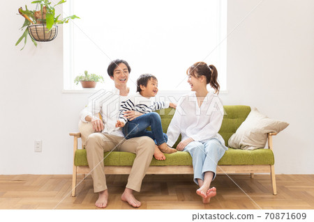 Family relaxing on the sofa 70871609