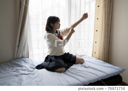High school girl getting dressed 70871738