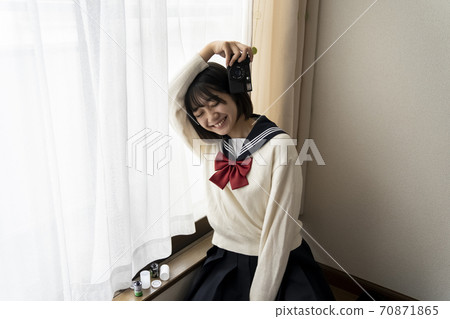 Camera and schoolgirl Camera and schoolgirl 70871865