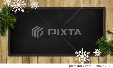 Blackboard decorated with snow ornaments and fir trees-there are multiple variations 70873705