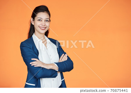 Smiling pretty female entrepreneur 70875441