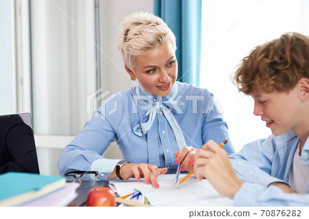 young blonde female tutor came to schoolboy at home young blonde female tutor came to schoolboy at home 70876282