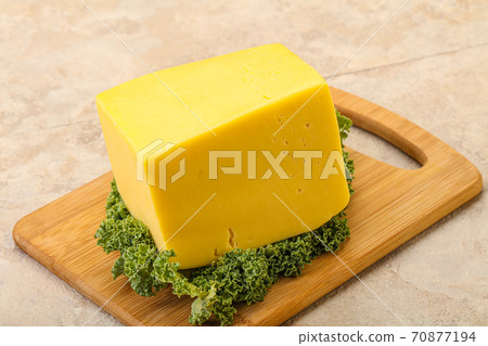 Yellow tilsiter cheese dairy product Yellow tilsiter cheese dairy product 70877194