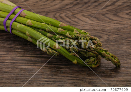 Vegan cuisine - Raw asparagus heap 70877409