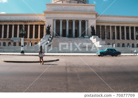 Woman walking at old sreets of Havana in Cuba Woman walking at old sreets of Havana in Cuba 70877709