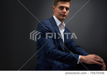 portrait of caucasian handsome male in stylish suit posing portrait of caucasian handsome male in stylish suit posing 70878496