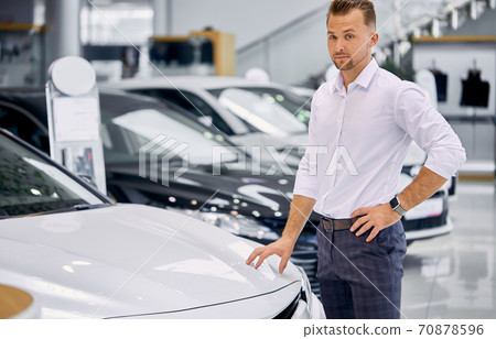 portrait of happy client man buying new car portrait of happy client man buying new car 70878596