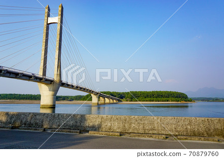 Sunset bridge in Minamisatsuma City, Kagoshima Prefecture. Sunset bridge in Minamisatsuma City, Kagoshima Prefecture. 70879760