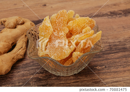 Dry sweet ginger in the bowl Dry sweet ginger in the bowl 70881475