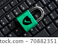 Master key on black keyboard, computer security privacy 70882351