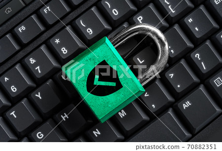 Master key on black keyboard, computer security privacy 70882351