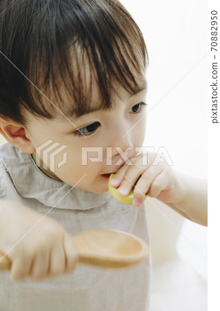 Infants playing with toys Infants playing with toys 70882950
