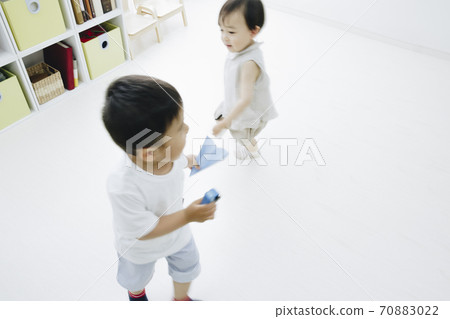 Playing toddler Playing toddler 70883022