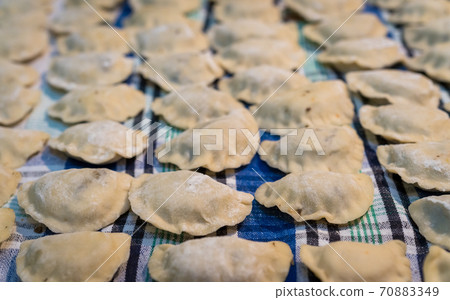 Traditonal Polish food called pierogi in raw form Traditonal Polish food called pierogi in raw form 70883349