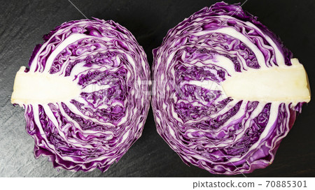 Close up view of fresh cut red cabbage with water drops Close up view of fresh cut red cabbage with water drops 70885301