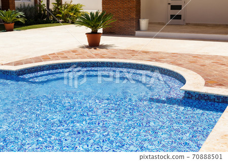 Empty swimming pool at sunny day. Empty swimming pool at sunny day. 70888501