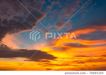 Sunset sky and clouds dyed in orange 70893164