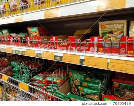 SEREMBAN, MALAYSIA -APRIL 2, 2020: The spices are sold in commercial packages and are displayed on shelves in the supermarket. Sort by brand and type to make it easier for customers to buy. 70895459