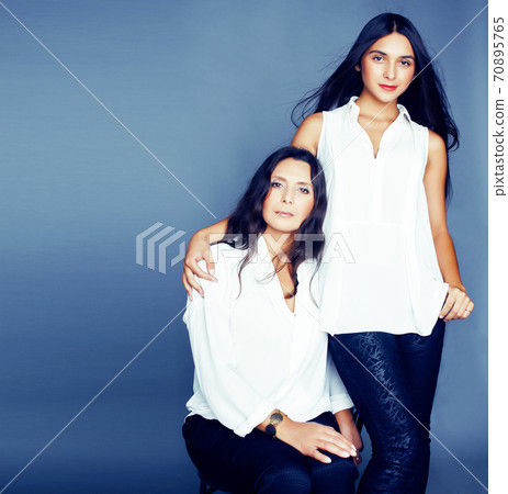 cute pretty teen daughter with mature mother hugging, fashion style brunette, lifestyle people concept cute pretty teen daughter with mature mother hugging, fashion style brunette, lifestyle people concept 70895765