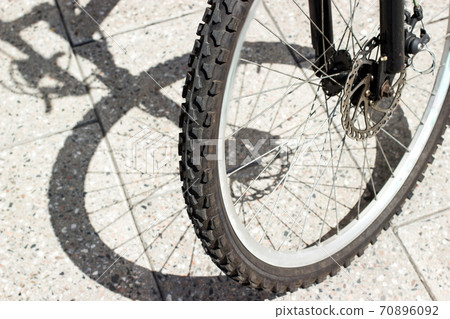 Bicycle wheel and tyre part grunge background Bicycle wheel and tyre part grunge background 70896092