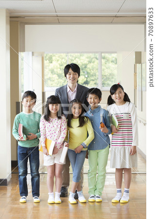 Elementary school students and teachers Elementary school students and teachers 70897633
