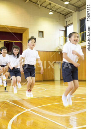 Elementary school student jumping rope 70897851
