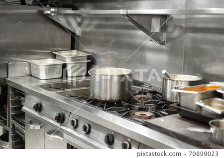 Stainless steel restaurant professional kitchen equipment and work surface. Stainless steel restaurant professional kitchen equipment and work surface. 70899023
