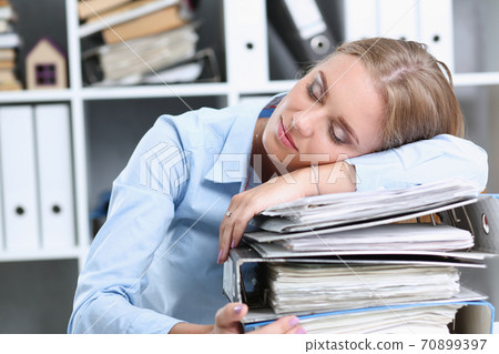 Lot of work wait for tired and exhausted woman Lot of work wait for tired and exhausted woman 70899397