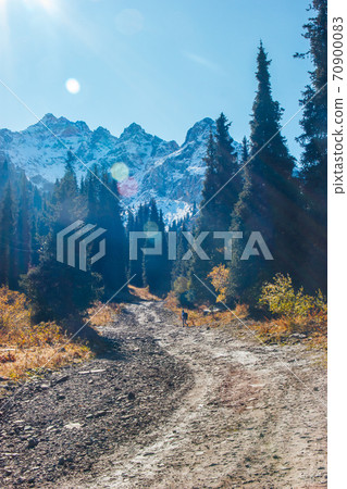 Dirt road and hiking trail track in Tian Shan mountain, Kazakhstan, in Almaty countryside, Tuyuk su gorge Dirt road and hiking trail track in Tian Shan mountain, Kazakhstan, in Almaty countryside, Tuyuk su gorge 70900083