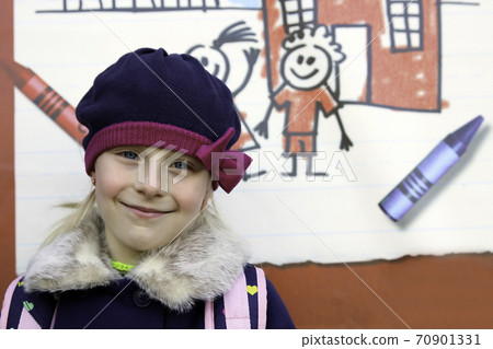 Beautiful girl standing near with school board outside.Back to school Beautiful girl standing near with school board outside.Back to school 70901331