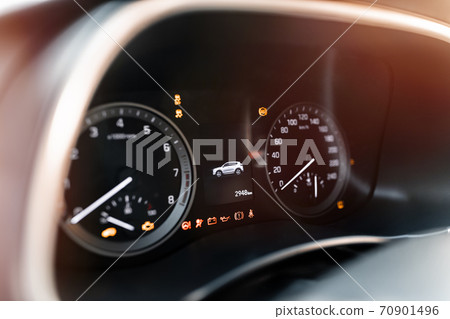 MURES, ROMANIA - OCTOBER 21, 2020, interior view of brand new Hyundai Tucson 2020. Close up of instrument panel with odometer, speedometer and fuel level. 70901496