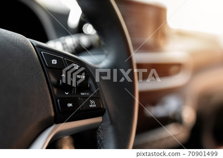 MURES, ROMANIA - OCTOBER 21, 2020, interior view of brand new Hyundai Tucson 2020. Leather covered wheel with audio control buttons. 70901499